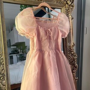 Selkie-inspired peach pink puff sleeve princess dress